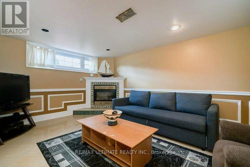 21 Dalrymple Drive, Toronto, ON - Indoor Photo Showing Living Room With Fireplace