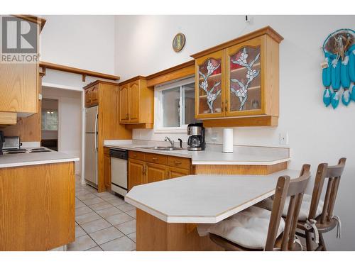 9611 Kilkenny Place, Fintry, BC - Indoor Photo Showing Kitchen With Double Sink