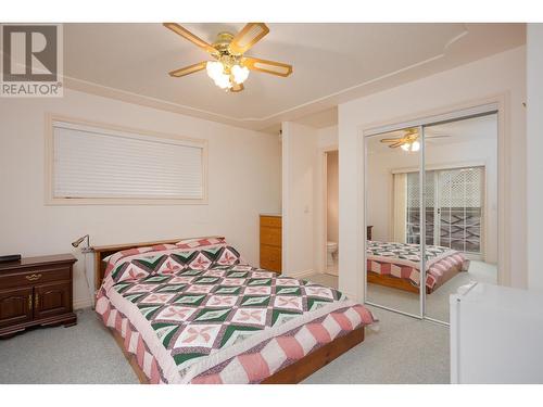 9611 Kilkenny Place, Fintry, BC - Indoor Photo Showing Bedroom