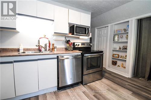 585 John Street N, Hamilton, ON - Indoor Photo Showing Kitchen With Double Sink