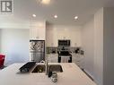 7105 Parsa Street, Niagara Falls, ON  - Indoor Photo Showing Kitchen 