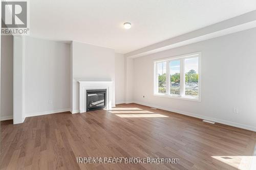 10 Bird Street, Norfolk, ON - Indoor Photo Showing Other Room With Fireplace