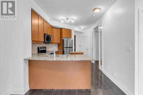 907 - 90 Absolute Avenue, Mississauga, ON - Indoor Photo Showing Kitchen With Double Sink