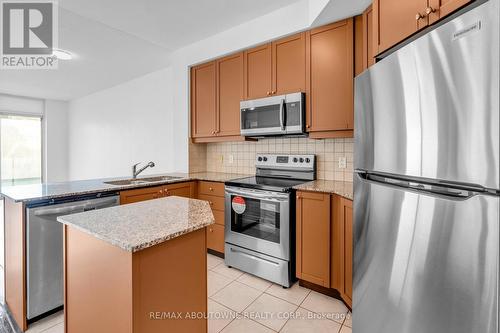 907 - 90 Absolute Avenue, Mississauga, ON - Indoor Photo Showing Kitchen With Stainless Steel Kitchen With Double Sink