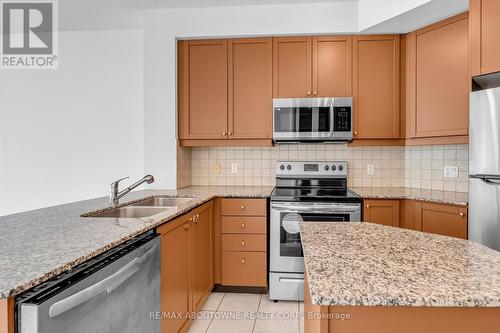 907 - 90 Absolute Avenue, Mississauga, ON - Indoor Photo Showing Kitchen With Stainless Steel Kitchen With Double Sink