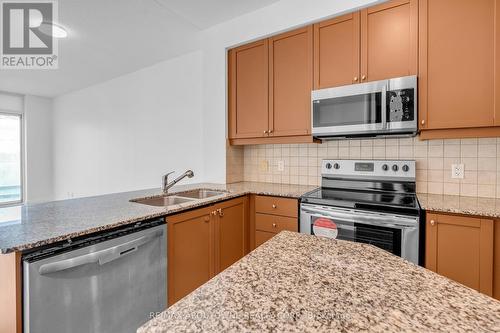 907 - 90 Absolute Avenue, Mississauga, ON - Indoor Photo Showing Kitchen With Double Sink