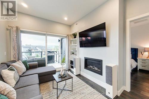 301 - 10 Beausoleil Lane, Blue Mountains, ON - Indoor Photo Showing Living Room With Fireplace