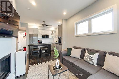 301 - 10 Beausoleil Lane, Blue Mountains, ON - Indoor Photo Showing Living Room With Fireplace