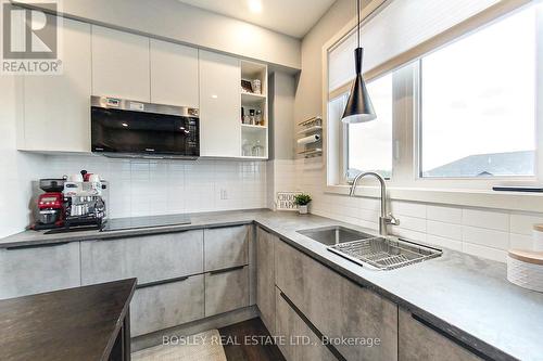 301 - 10 Beausoleil Lane, Blue Mountains, ON - Indoor Photo Showing Kitchen With Double Sink