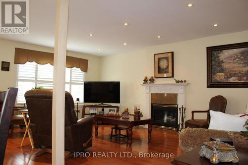 76 Stavely Crescent, Toronto, ON - Indoor Photo Showing Living Room With Fireplace