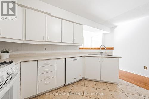 3 - 3333 New Street, Burlington, ON - Indoor Photo Showing Kitchen With Double Sink