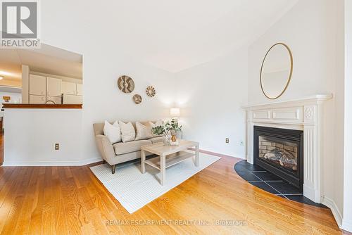 3 - 3333 New Street, Burlington, ON - Indoor Photo Showing Living Room With Fireplace