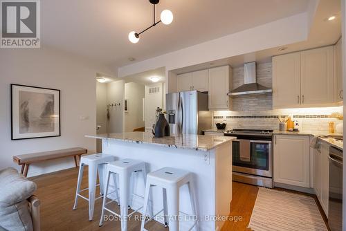 303 - 15 Sousa Mendes Street, Toronto, ON - Indoor Photo Showing Kitchen With Upgraded Kitchen