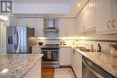 303 - 15 Sousa Mendes Street, Toronto, ON  - Indoor Photo Showing Kitchen With Double Sink With Upgraded Kitchen 