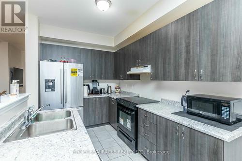 85 Royal Fern Crescent, Caledon, ON - Indoor Photo Showing Kitchen With Double Sink