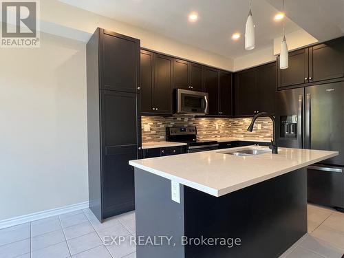 749 Elsley Court, Milton, ON - Indoor Photo Showing Kitchen With Double Sink With Upgraded Kitchen