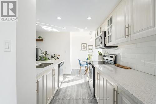 1403 - 30 Malta Avenue, Brampton, ON - Indoor Photo Showing Kitchen With Double Sink