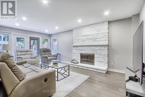 4149 Bridlepath Trail, Mississauga, ON - Indoor Photo Showing Living Room With Fireplace