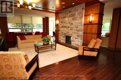 810 - 1055 Southdown Road, Mississauga, ON - Indoor With Fireplace