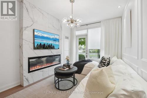 116 - 8228 Birchmount Road, Markham, ON - Indoor With Fireplace