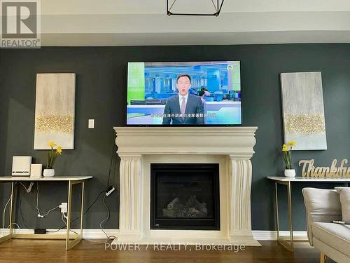 28 John Smith Street, East Gwillimbury, ON - Indoor Photo Showing Living Room With Fireplace