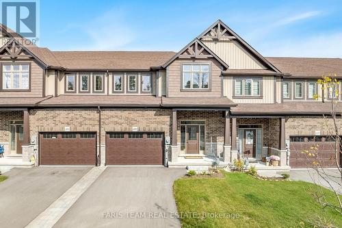 1052 Wright Drive, Midland, ON - Outdoor With Facade