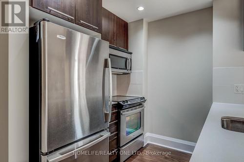 201 - 100 Harrison Gardens Boulevard, Toronto, ON - Indoor Photo Showing Kitchen