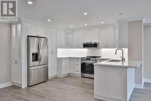 104 - 90 Fisherville Road, Toronto, ON - Indoor Photo Showing Kitchen With Upgraded Kitchen