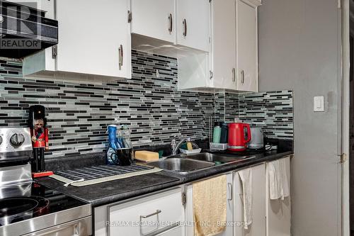 95 Rogers Road, Toronto, ON - Indoor Photo Showing Kitchen With Double Sink