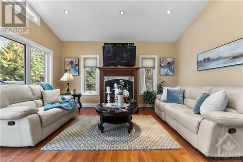 1096 Snye Road, Lanark Highlands, ON - Indoor Photo Showing Living Room With Fireplace