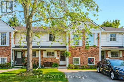 31 - 129 Victoria Road N, Guelph, ON - Outdoor With Facade