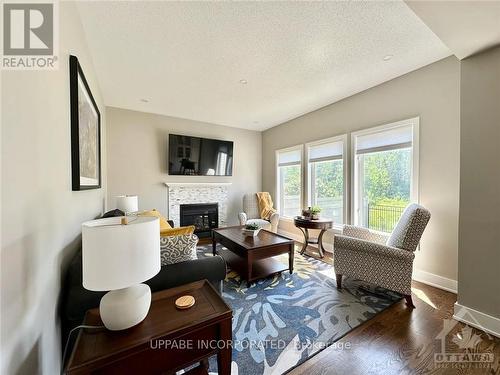 1934 Pennyroyal Crescent, Ottawa, ON - Indoor Photo Showing Living Room With Fireplace