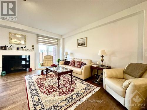 316 Wigwas Street, Ottawa, ON - Indoor Photo Showing Living Room With Fireplace