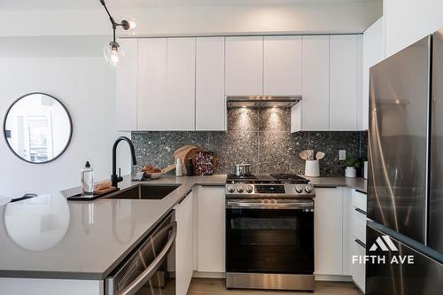 204 7936 206 Street, Langley, BC - Indoor Photo Showing Kitchen With Stainless Steel Kitchen With Upgraded Kitchen