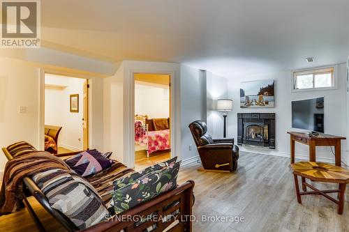 Lower Rec room - 71641 Old Cedarbank Lane, Bluewater (Dashwood), ON - Indoor Photo Showing Living Room With Fireplace