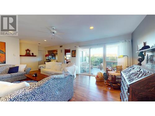 Lower Level Family Room - 11905 Quail Ridge Place, Osoyoos, BC - Indoor Photo Showing Living Room With Fireplace