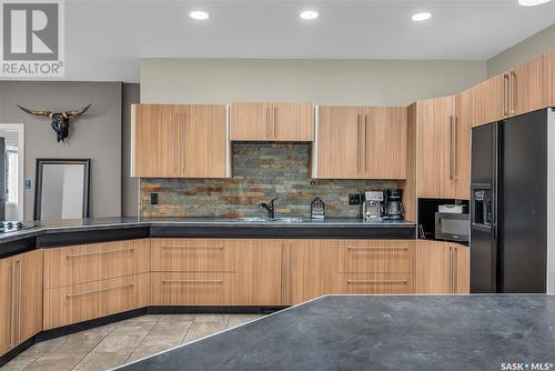 314 Centre Avenue, Meadow Lake, SK - Indoor Photo Showing Kitchen With Double Sink