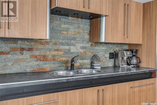 314 Centre Avenue, Meadow Lake, SK - Indoor Photo Showing Kitchen With Double Sink