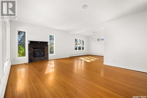 2700 Quinn Drive, Regina, SK - Indoor Photo Showing Living Room With Fireplace