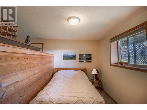 6540 Stanley Road, Ta Ta Creek, BC - Indoor Photo Showing Bedroom