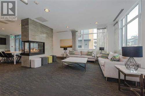 1703 188 Agnes Street, New Westminster, BC - Indoor Photo Showing Living Room With Fireplace