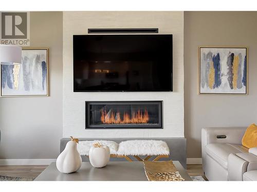 1044 James Hockey Place, Kelowna, BC - Indoor Photo Showing Living Room With Fireplace