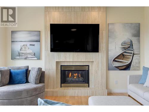 1044 James Hockey Place, Kelowna, BC - Indoor Photo Showing Living Room With Fireplace