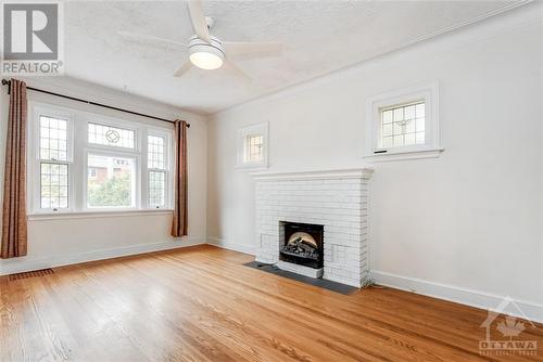 433 Holland Avenue, Ottawa, ON - Indoor Photo Showing Living Room With Fireplace