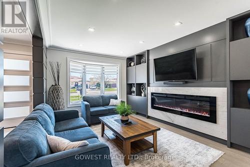 123 Dewitt Road, Hamilton, ON - Indoor Photo Showing Living Room With Fireplace