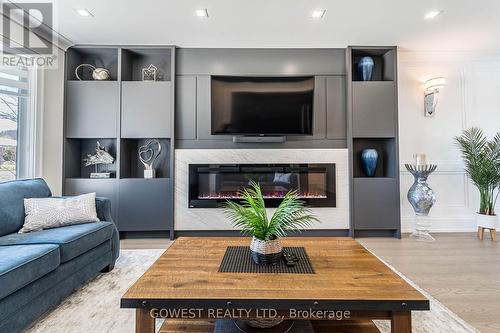 123 Dewitt Road, Hamilton, ON - Indoor Photo Showing Living Room With Fireplace