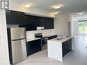 Upper - 231 Webb Street, Markham, ON  - Indoor Photo Showing Kitchen With Double Sink 