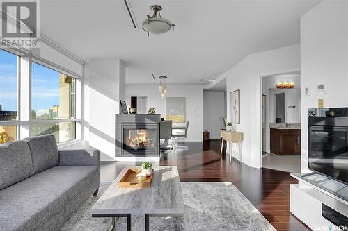 706 2300 Broad Street, Regina, SK - Indoor Photo Showing Living Room With Fireplace