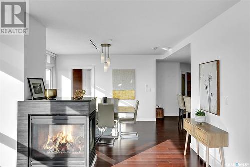 706 2300 Broad Street, Regina, SK - Indoor Photo Showing Living Room With Fireplace