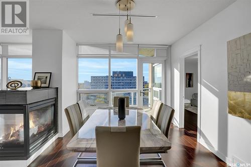 706 2300 Broad Street, Regina, SK - Indoor Photo Showing Other Room With Fireplace